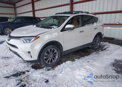 2018 Toyota Rav4 Limited z USA, uszkodzony, nr VIN JTMDFREV0JJ733931